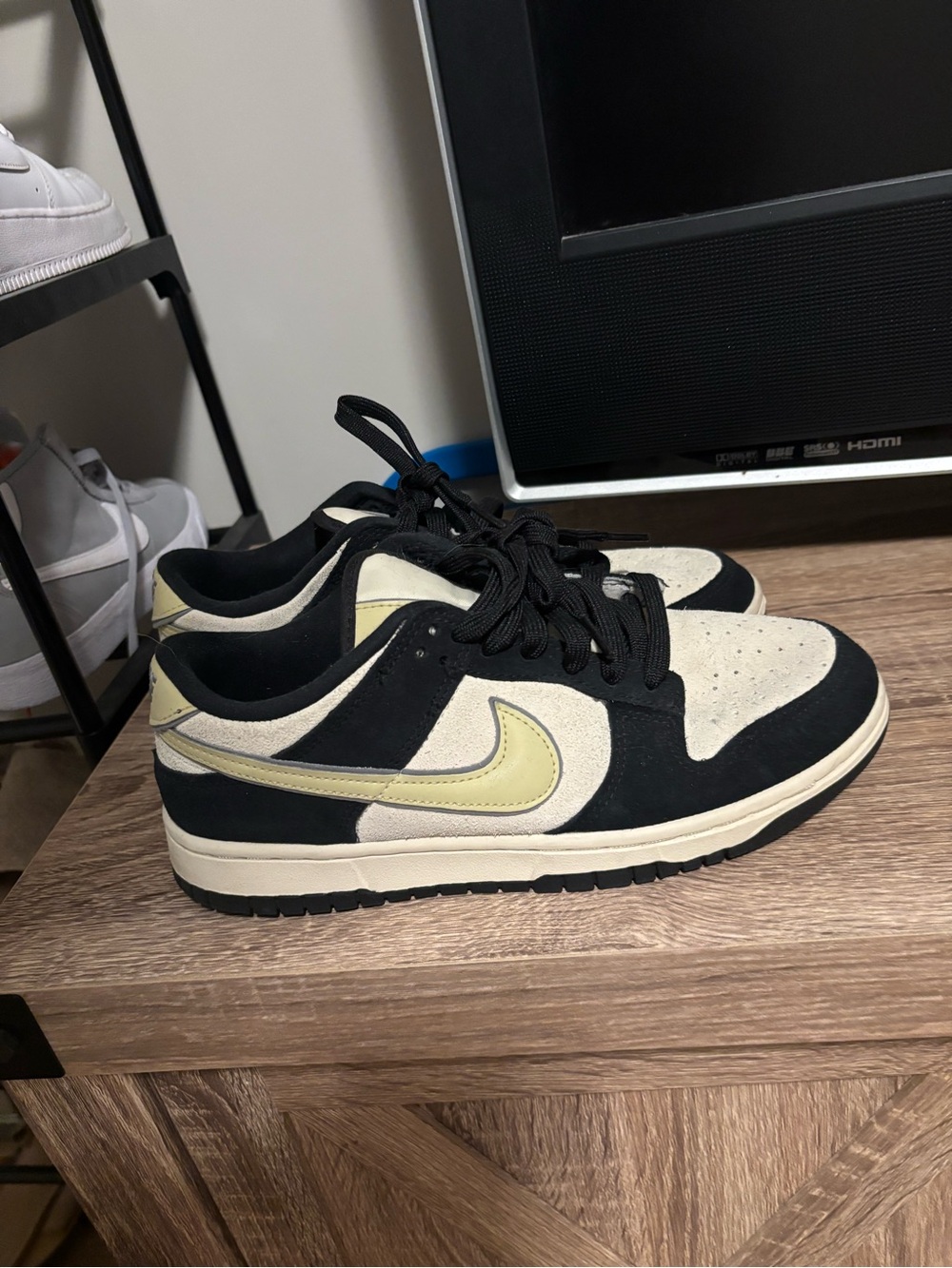 Nike Black and Cream Low-Top Dunks with Pale Yellow Swoosh